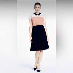 Kate Spade color block dress with pleated skirt. Size 6.